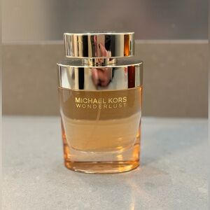 NWOT Michael Kors Wonderlust Gold and Orange Bottle